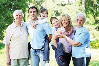 Photo of a family smiling. Link to Life Stage Gift Planner Ages 60-70 Situations.